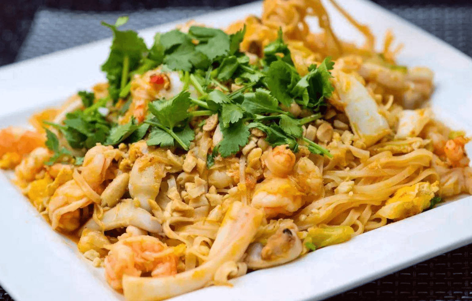 Delicious Pad Thai Noodles With Fresh Coriander Wallpaper