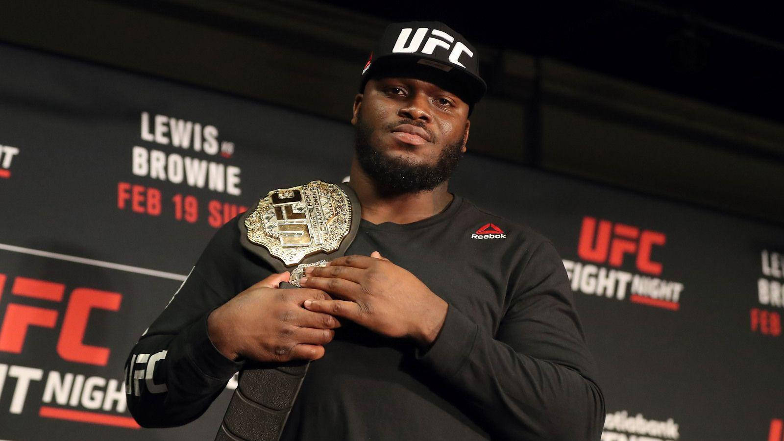 Derrick Lewis Holding Belt Wallpaper