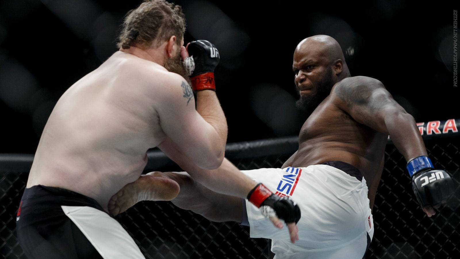 Derrick Lewis Kick Fight Stomach Wallpaper