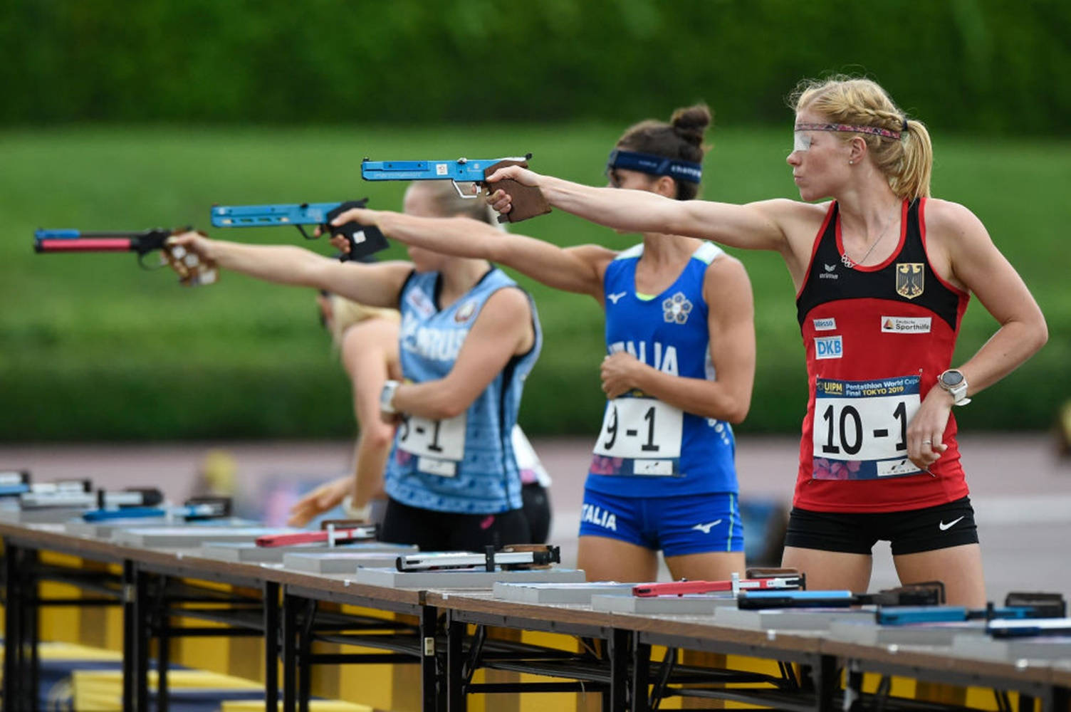 Determined Athletes Competing At The World Modern Pentathlon Championships Wallpaper