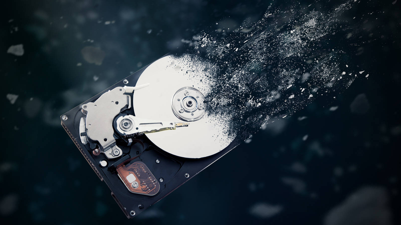 Dissolving Computer Hard Drive Disk Wallpaper