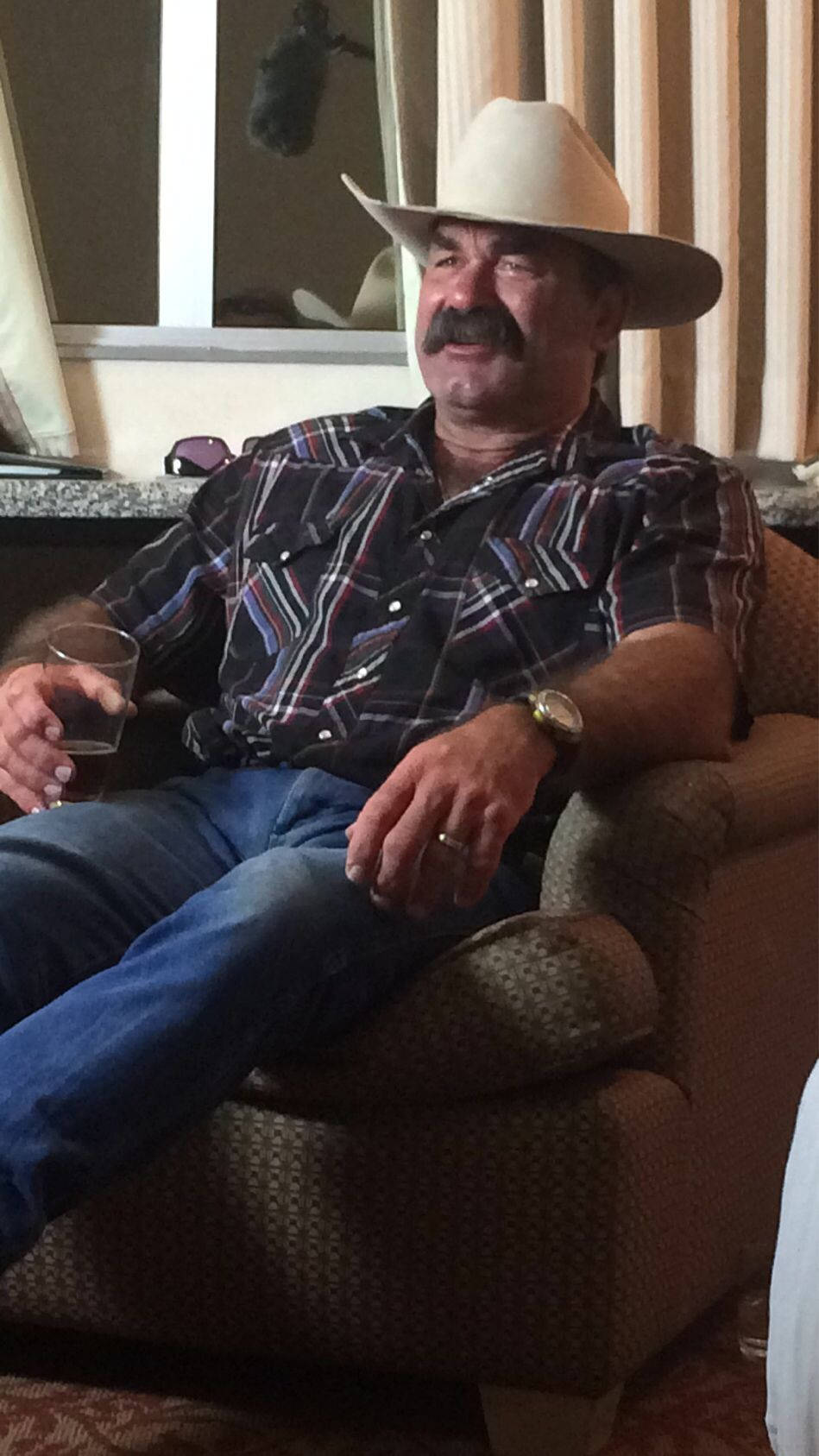 Don Frye Sitting On Armchair Wallpaper