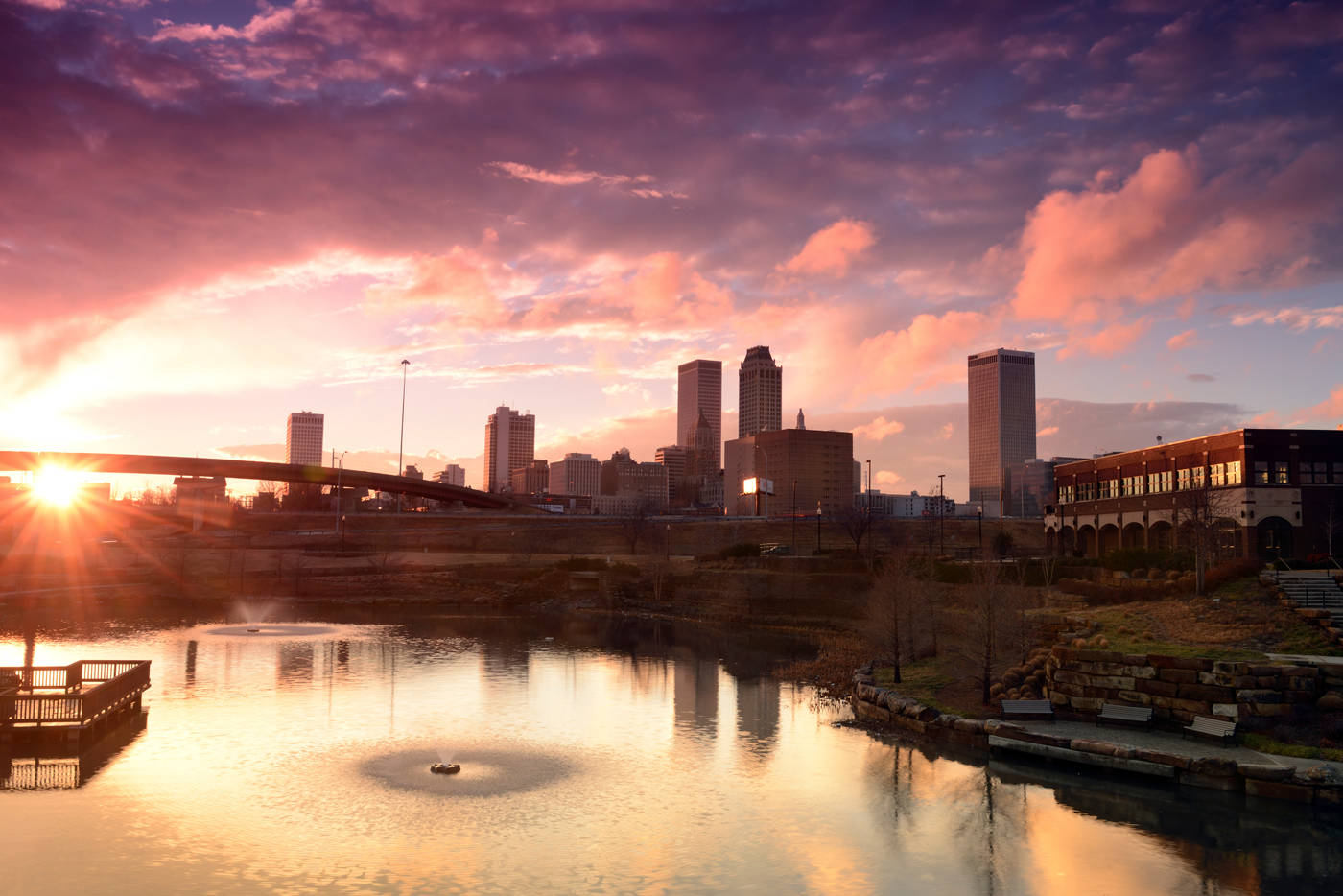 Downtown Tulsa With Body Of Water Wallpaper