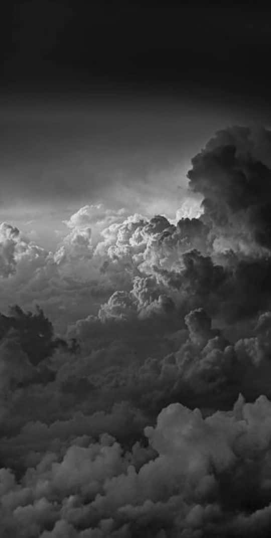 Dramatic Cloudscapein Blackand White Wallpaper