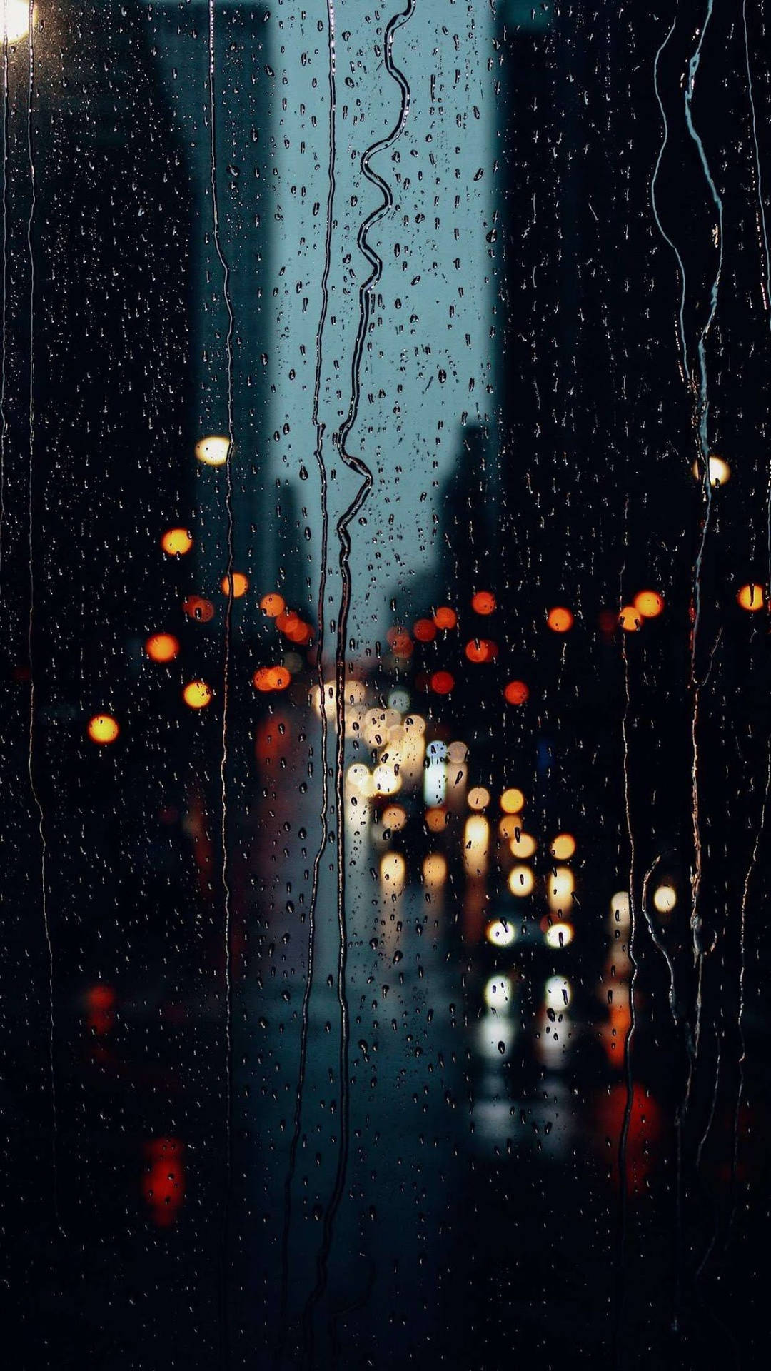 Dripping Raindrops On A Glass Pane Portrait Wallpaper