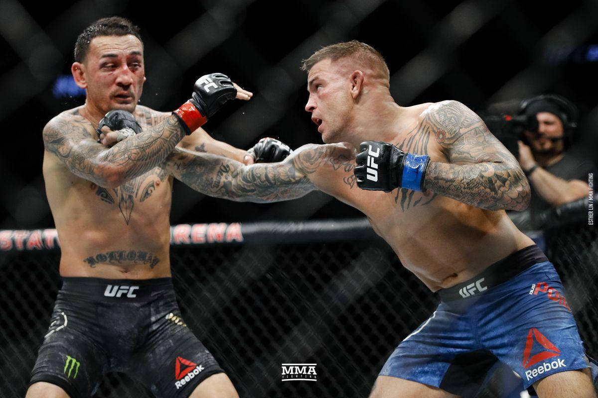 Dustin Poirier Punching Tired Max Wallpaper