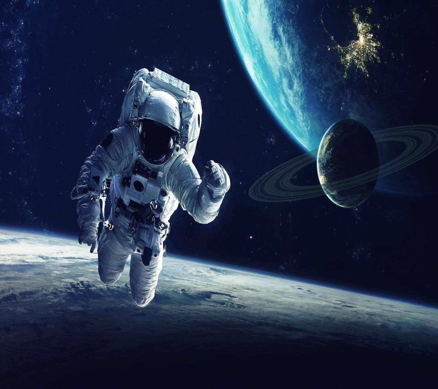 Earth Drifting Astronaut Wallpaper