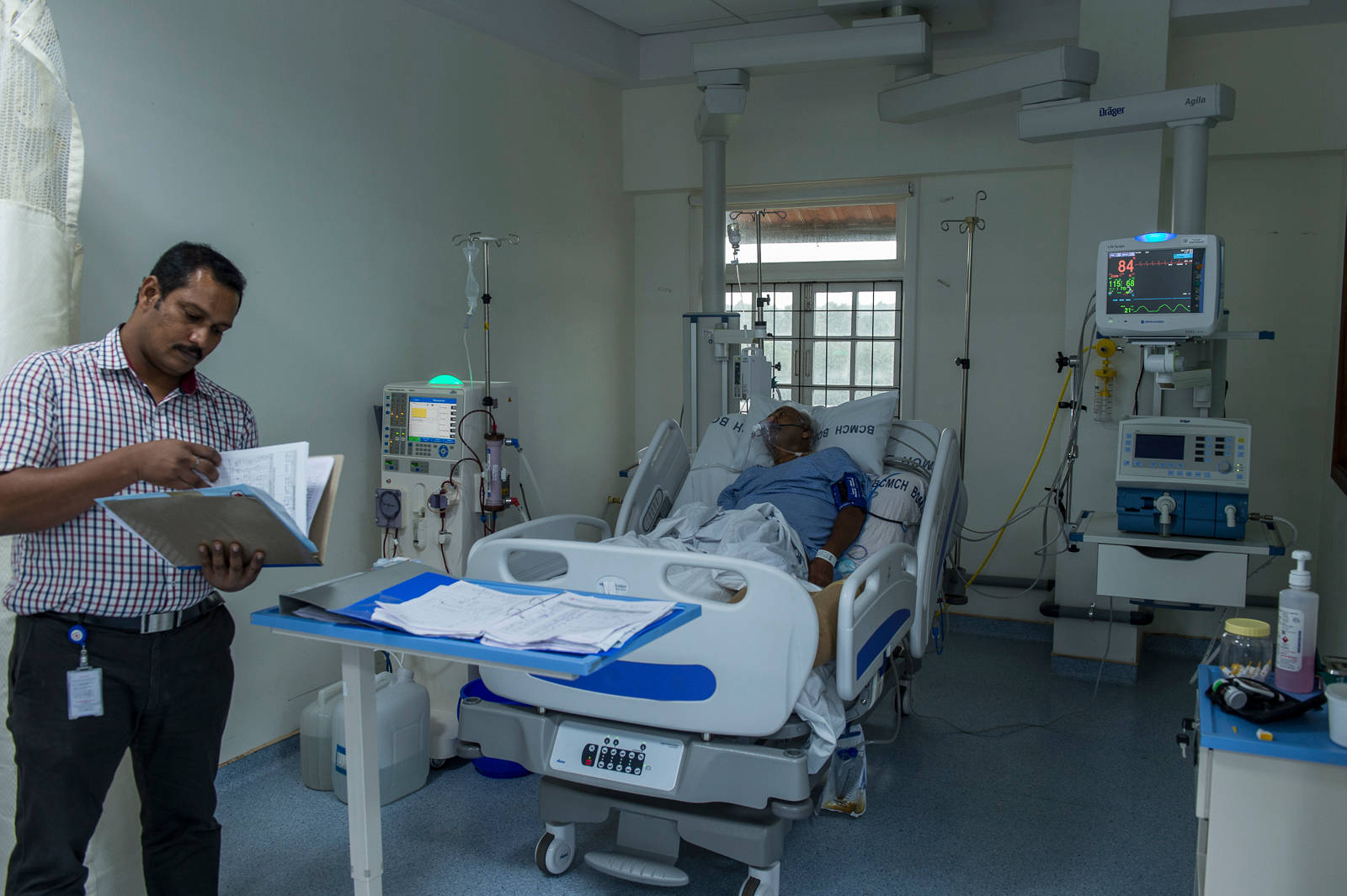 Elderly Patient In Hospital Room Wallpaper