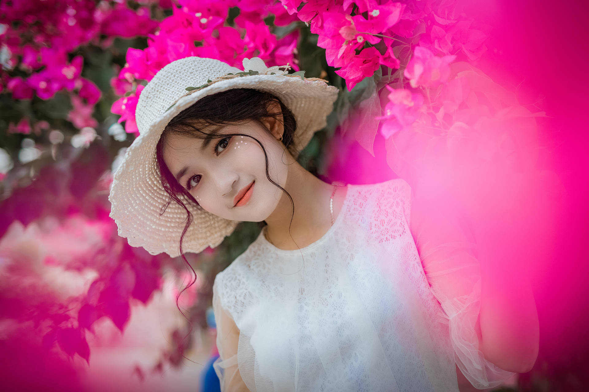 Elegance In Nature - Adorable Girl With Floral Hat Wallpaper