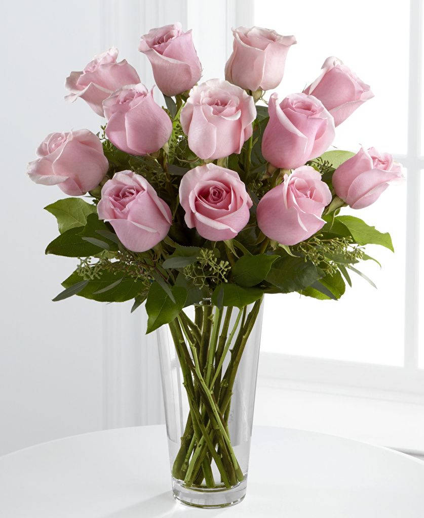 Elegant Pink Roses In A Crystal Vase Wallpaper