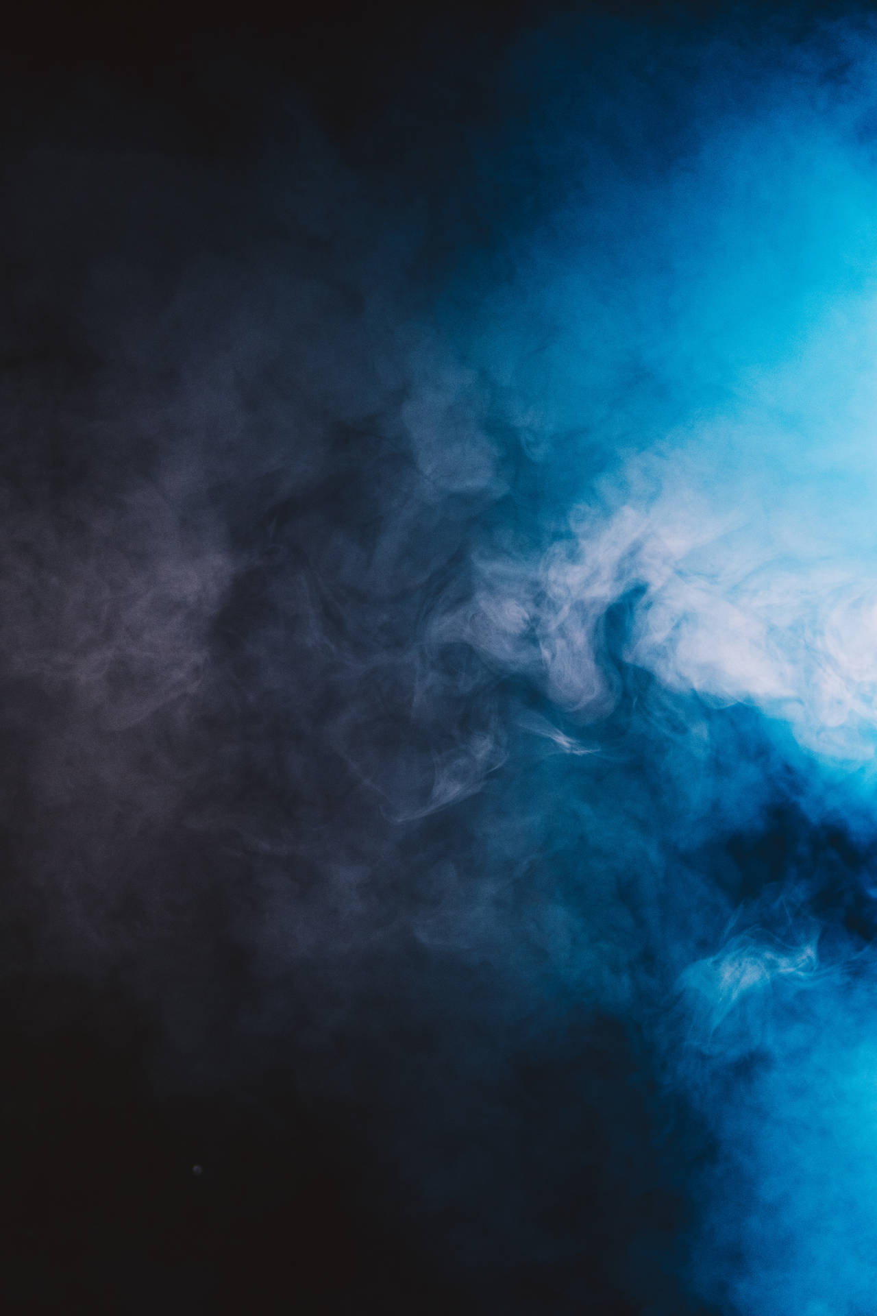 Enjoy The Tranquility Of Blue And Black Smoke Wallpaper