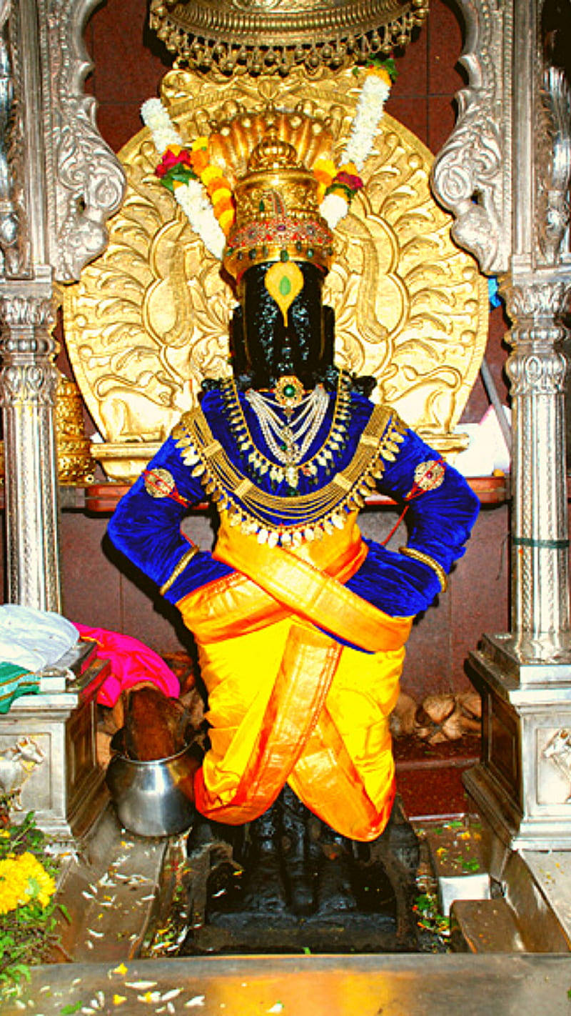 Enshrined Vithu Mauli Statue Wallpaper