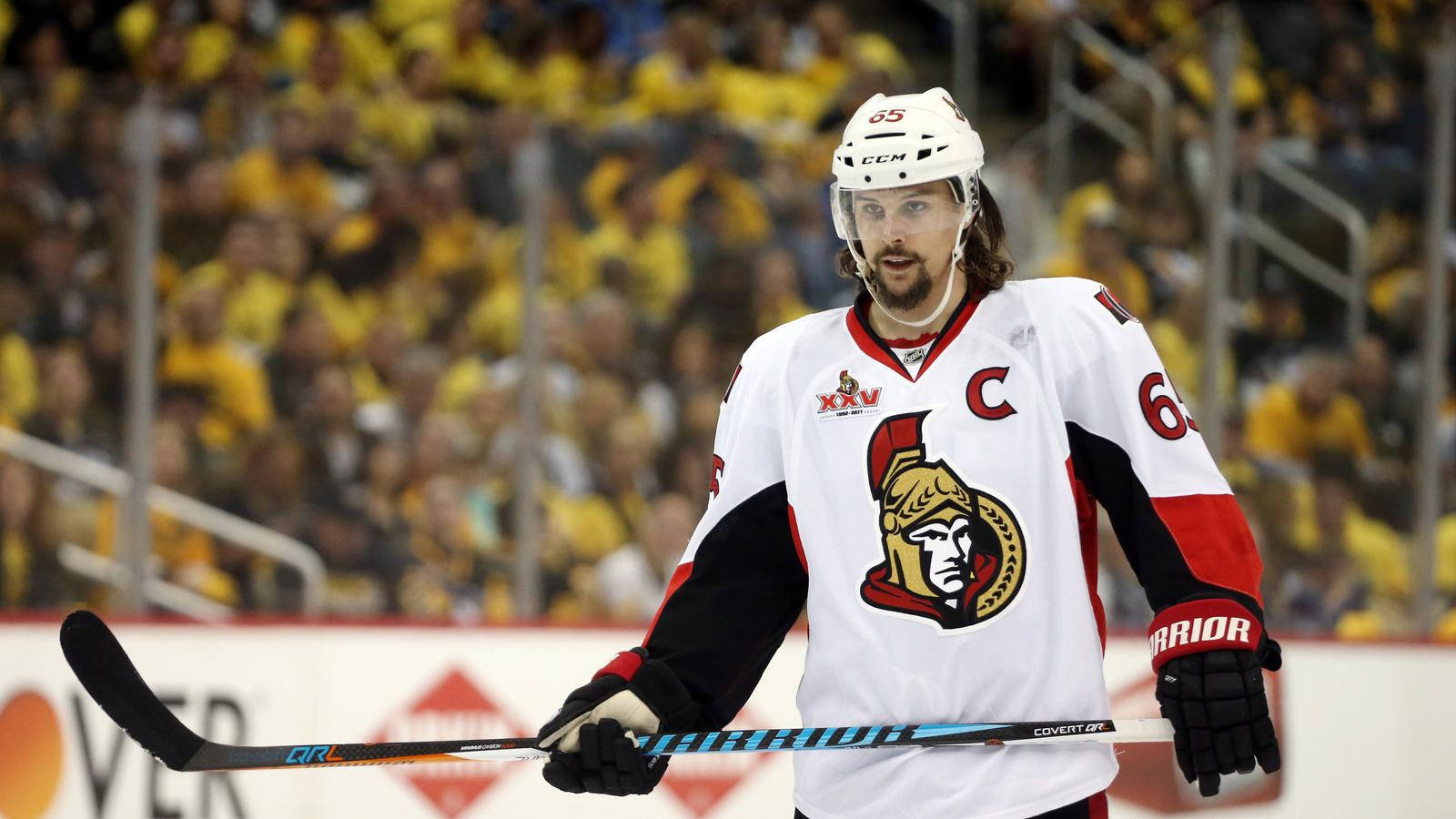 Erik Karlsson In White Ottawa Senators Jersey During A Game Wallpaper