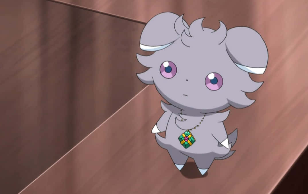 Espurr Wearing A Green Necklace Wallpaper