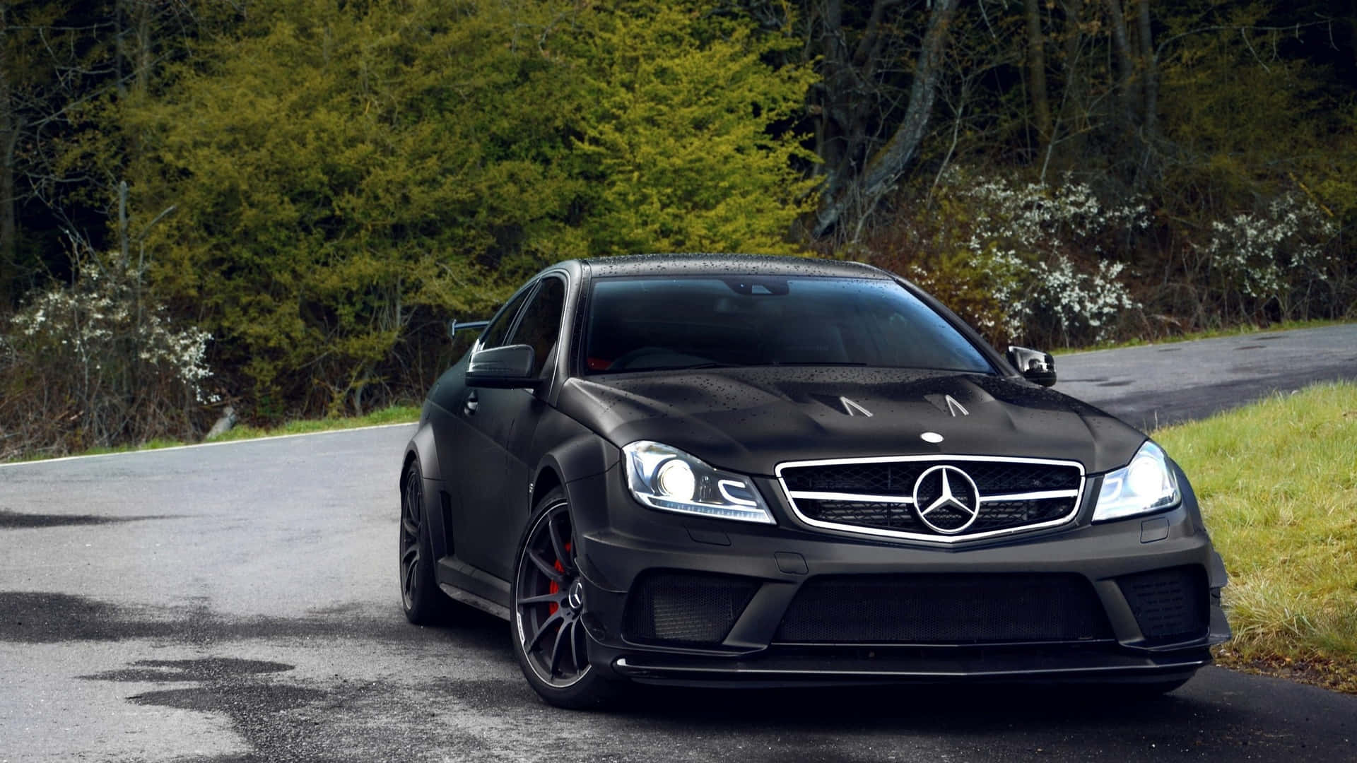 Expensive Black Mercedes Parked Wallpaper