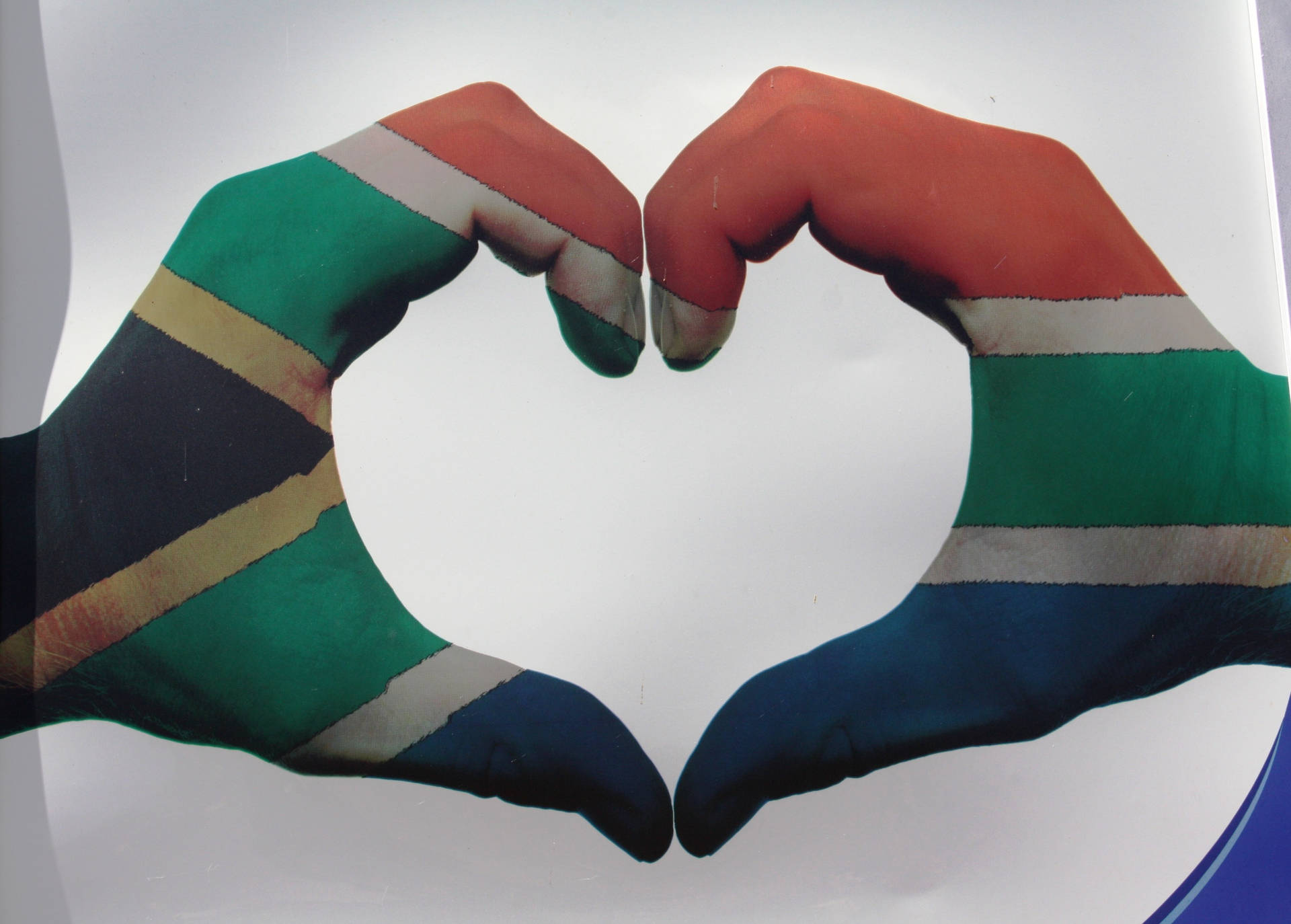 Expressing Love Through Hand Heart Shape Against South African Landscape Wallpaper