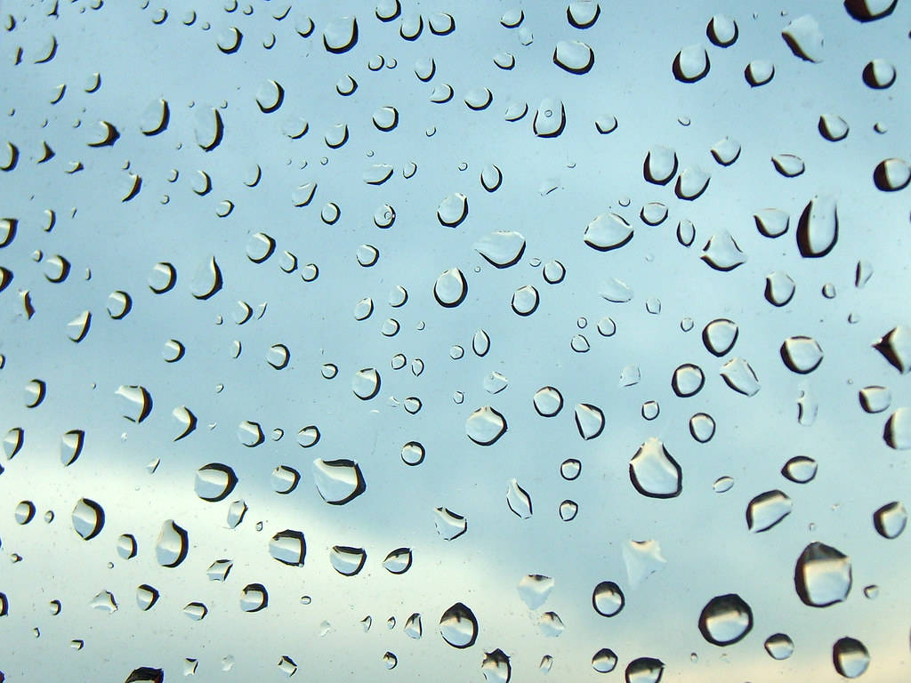 Extreme Close Up Glass Raindrops Wallpaper