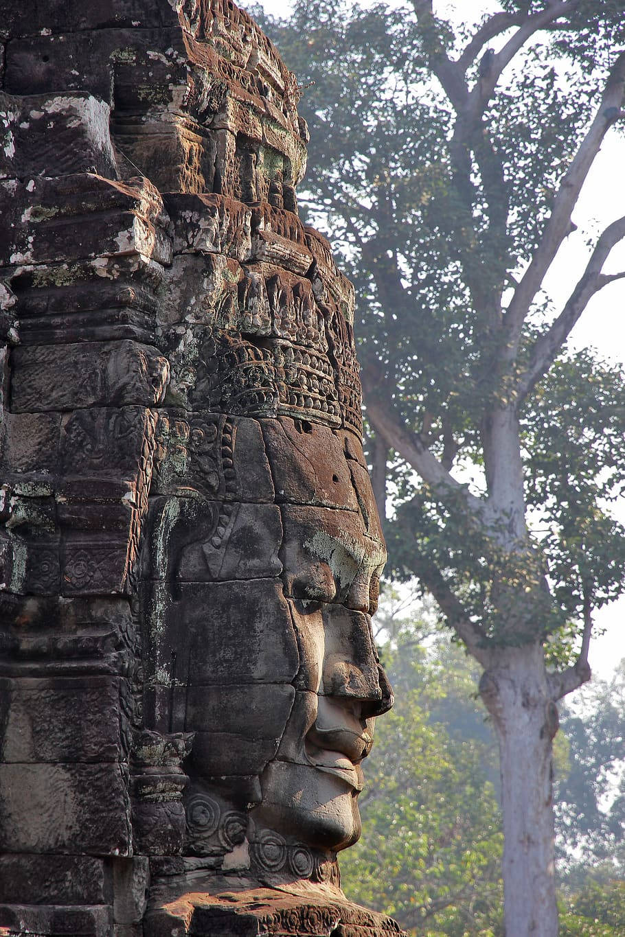 Face Statue In Angkor Wat Phone Wallpaper