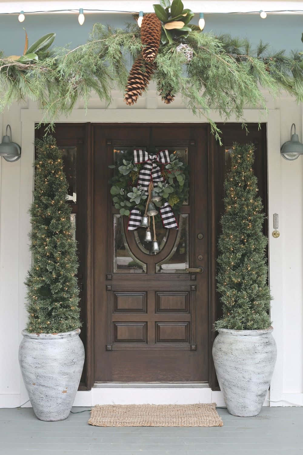 Farmhouse Christmas House With Plants In Vases Wallpaper