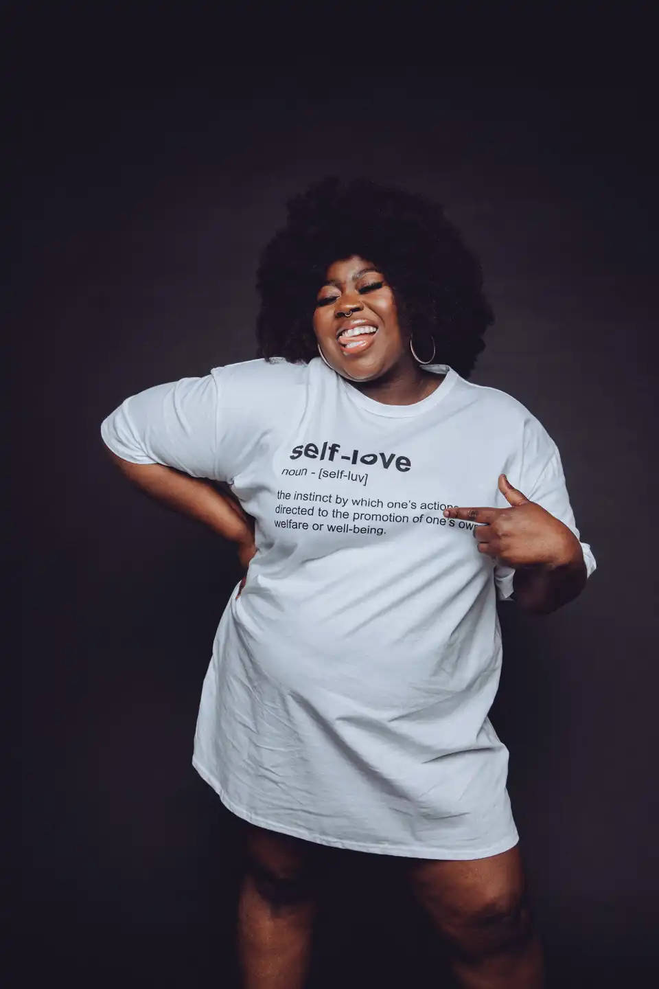 Fat Black Woman In Oversized Tee Wallpaper