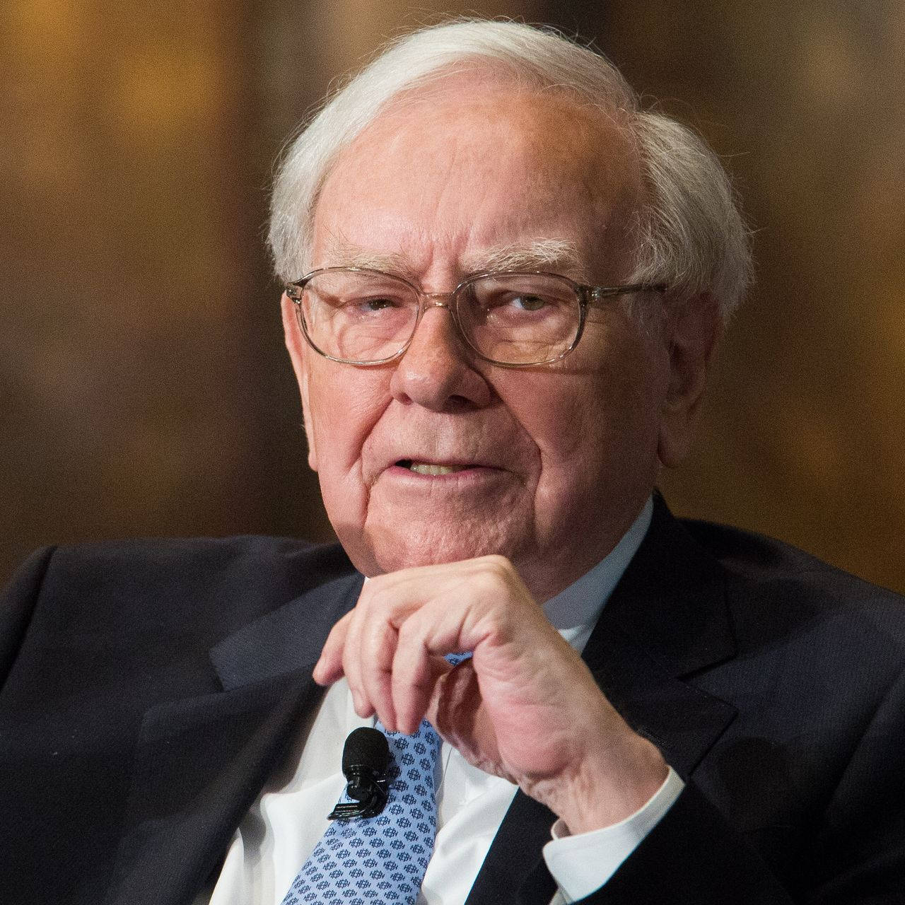 Financial Titan, Warren Buffett, In A Moment Of Serious Contemplation Wallpaper