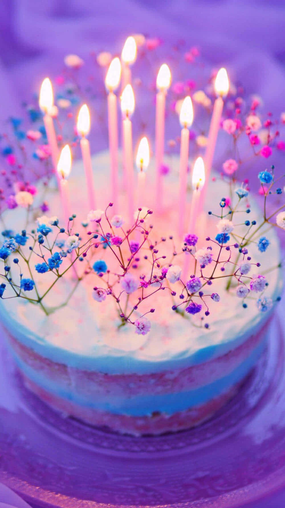 Floral Birthday Cakewith Candles Wallpaper