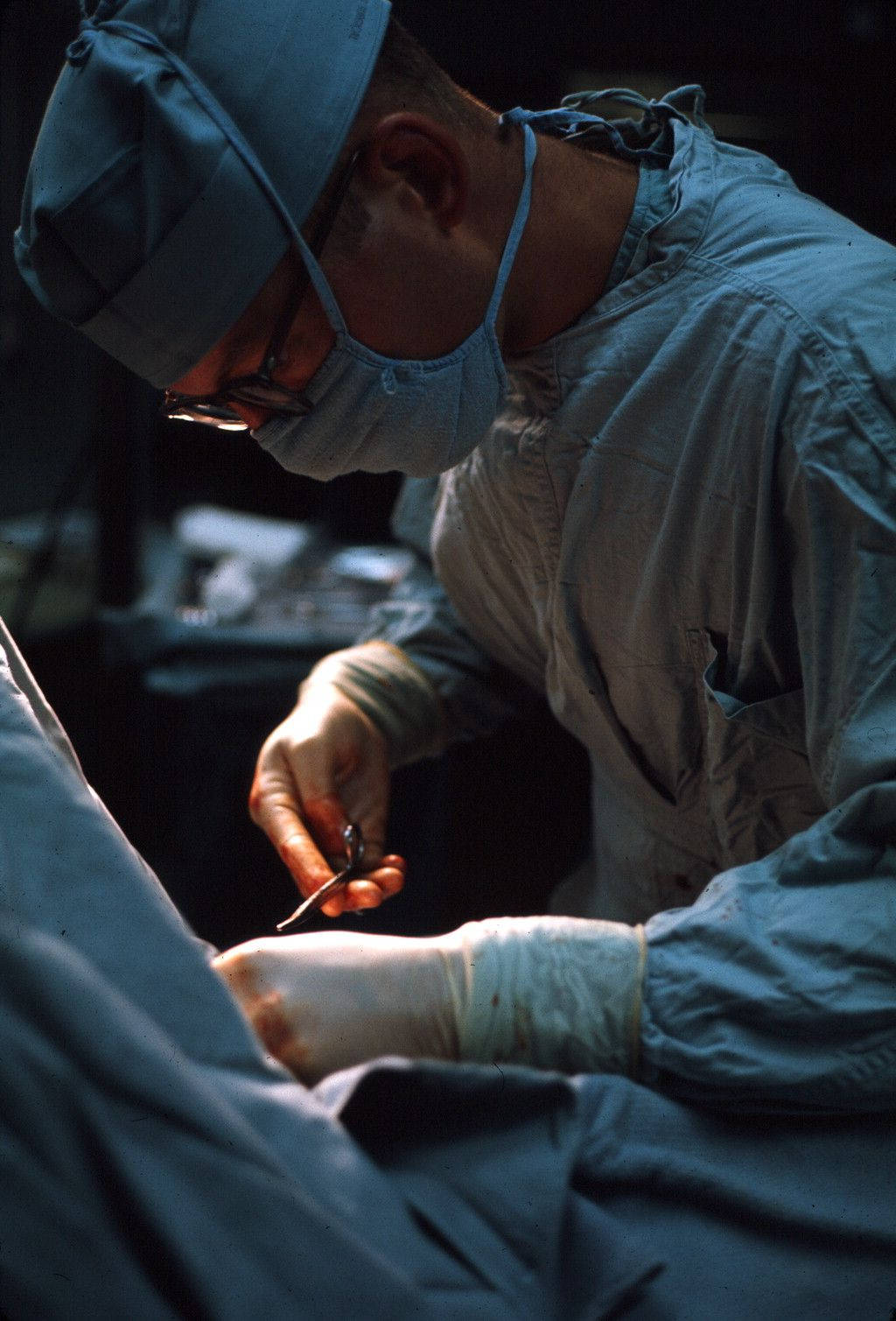 Focused Surgeon Performing Surgery Wallpaper