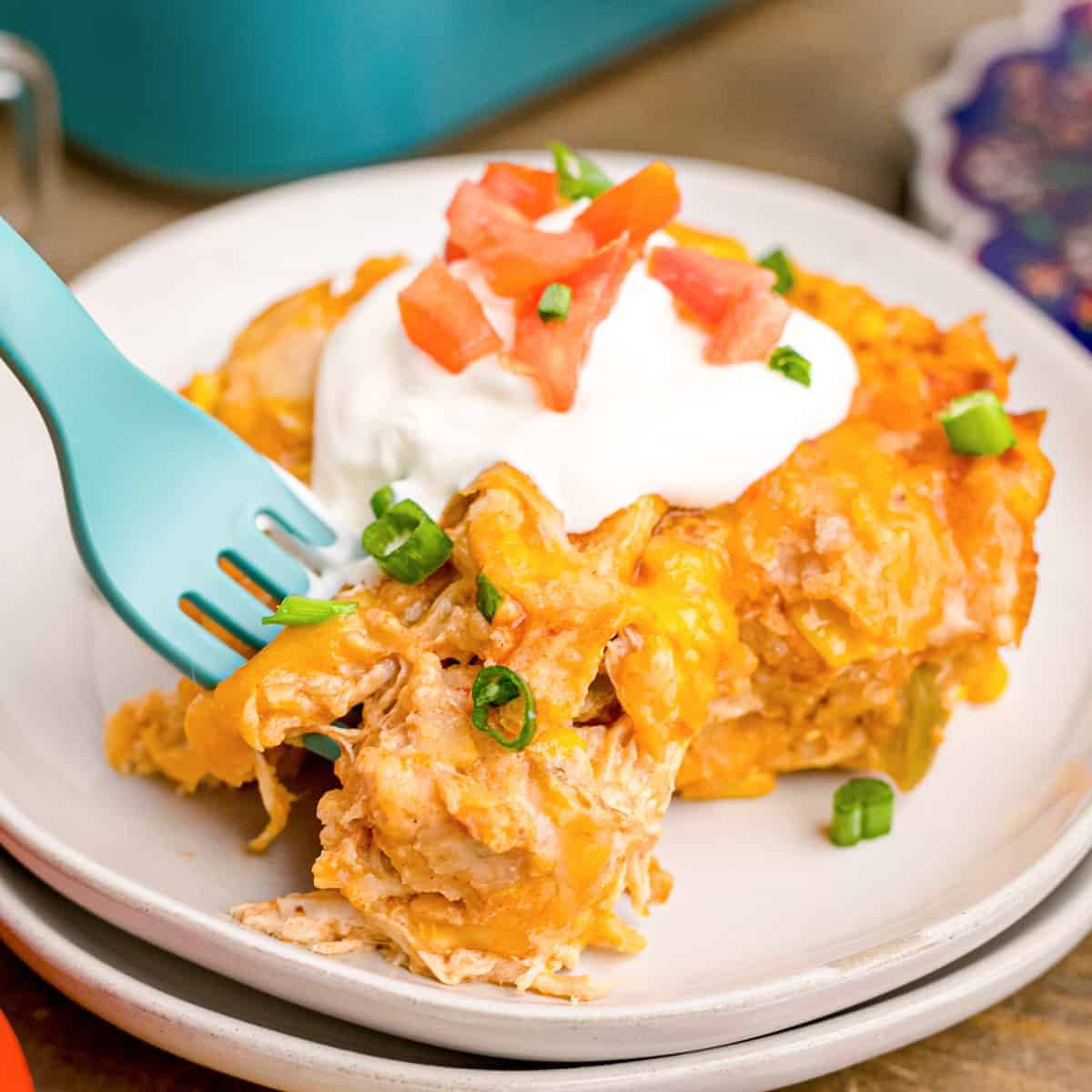 Fork Scooping Enchiladas On Plates Wallpaper