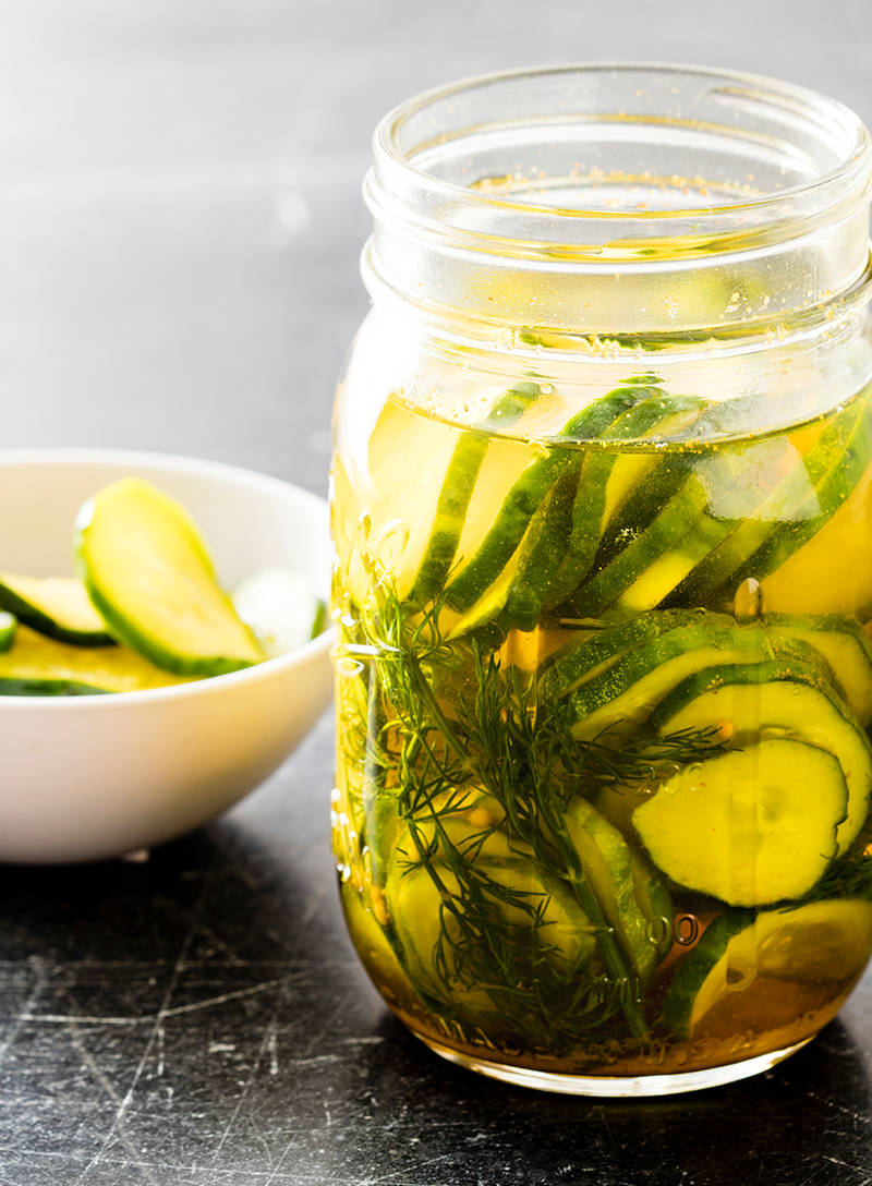 Fresh Pickled Cucumber Slices In A Mason Jar Wallpaper