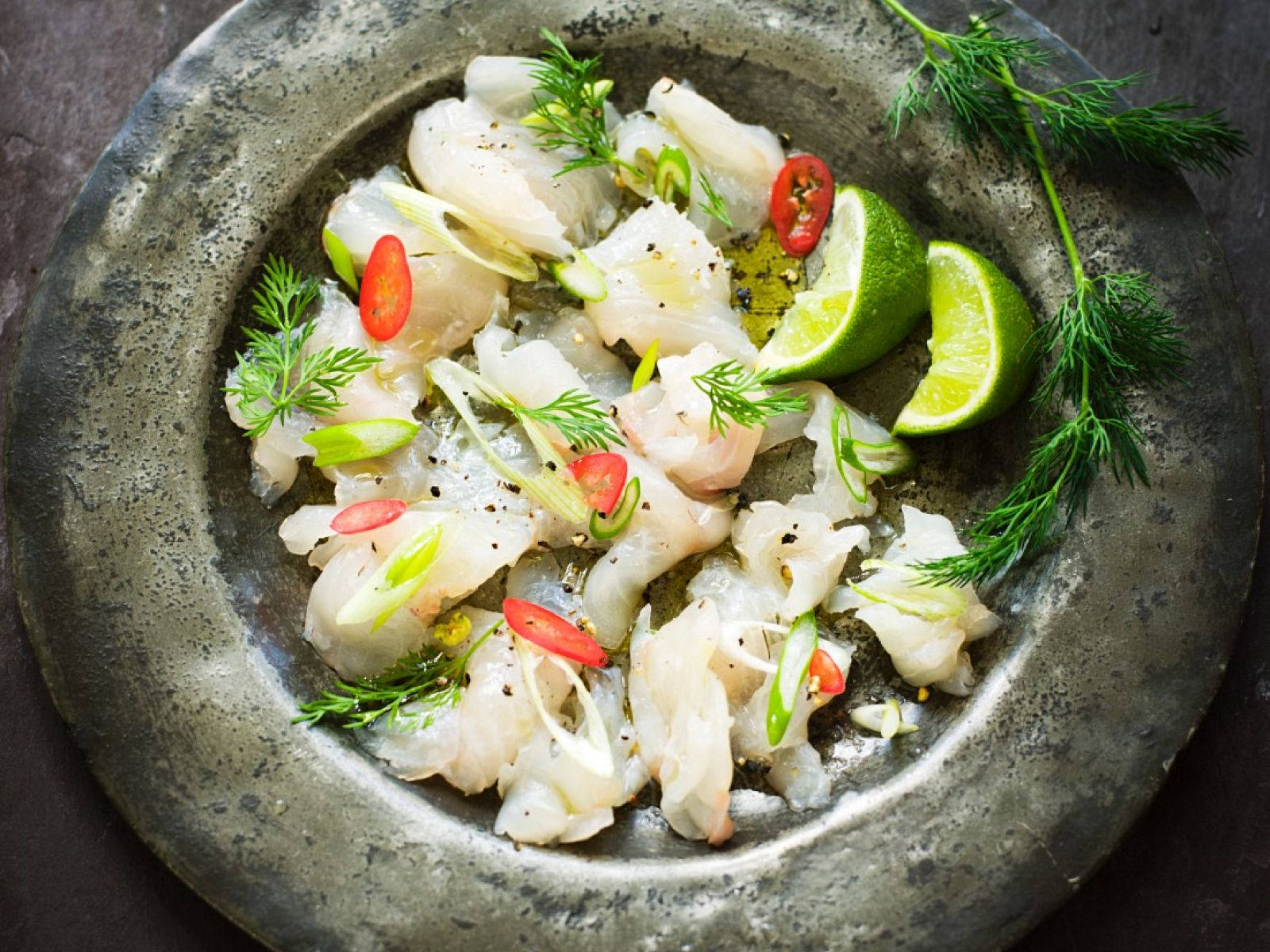 Freshly Prepared Zesty Ceviche On Stone Platter Wallpaper