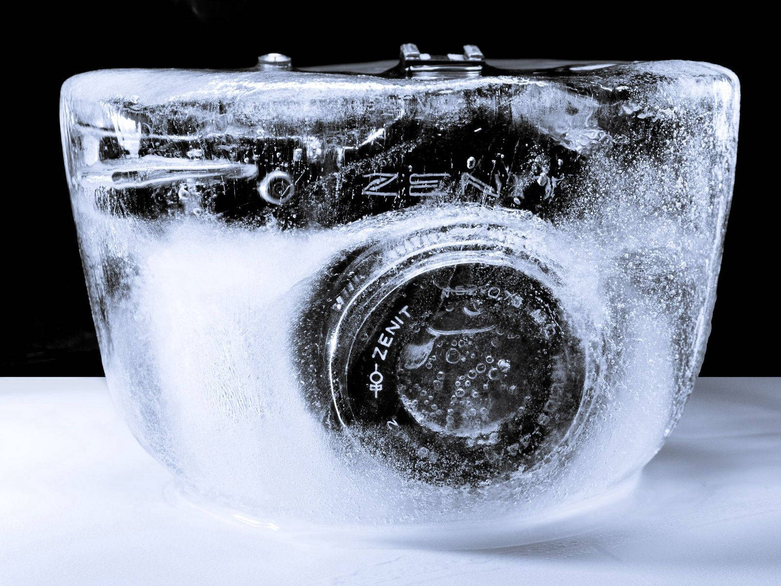 Frozen Camera In Ice Wallpaper