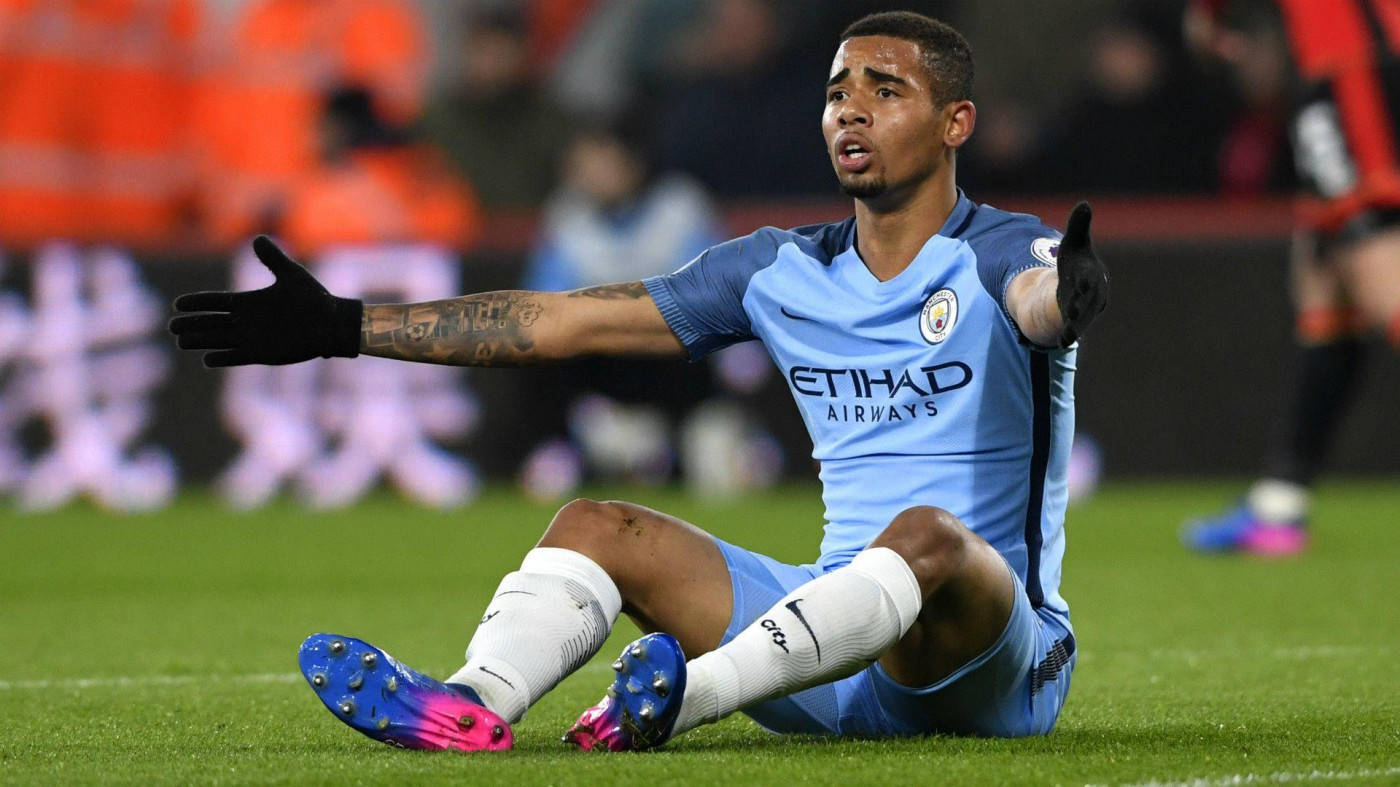 Gabriel Jesus Sits On The Ground Wallpaper