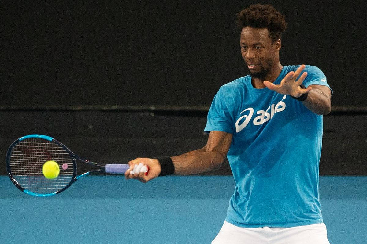 Gael Monfils In Action On Tennis Court Wallpaper