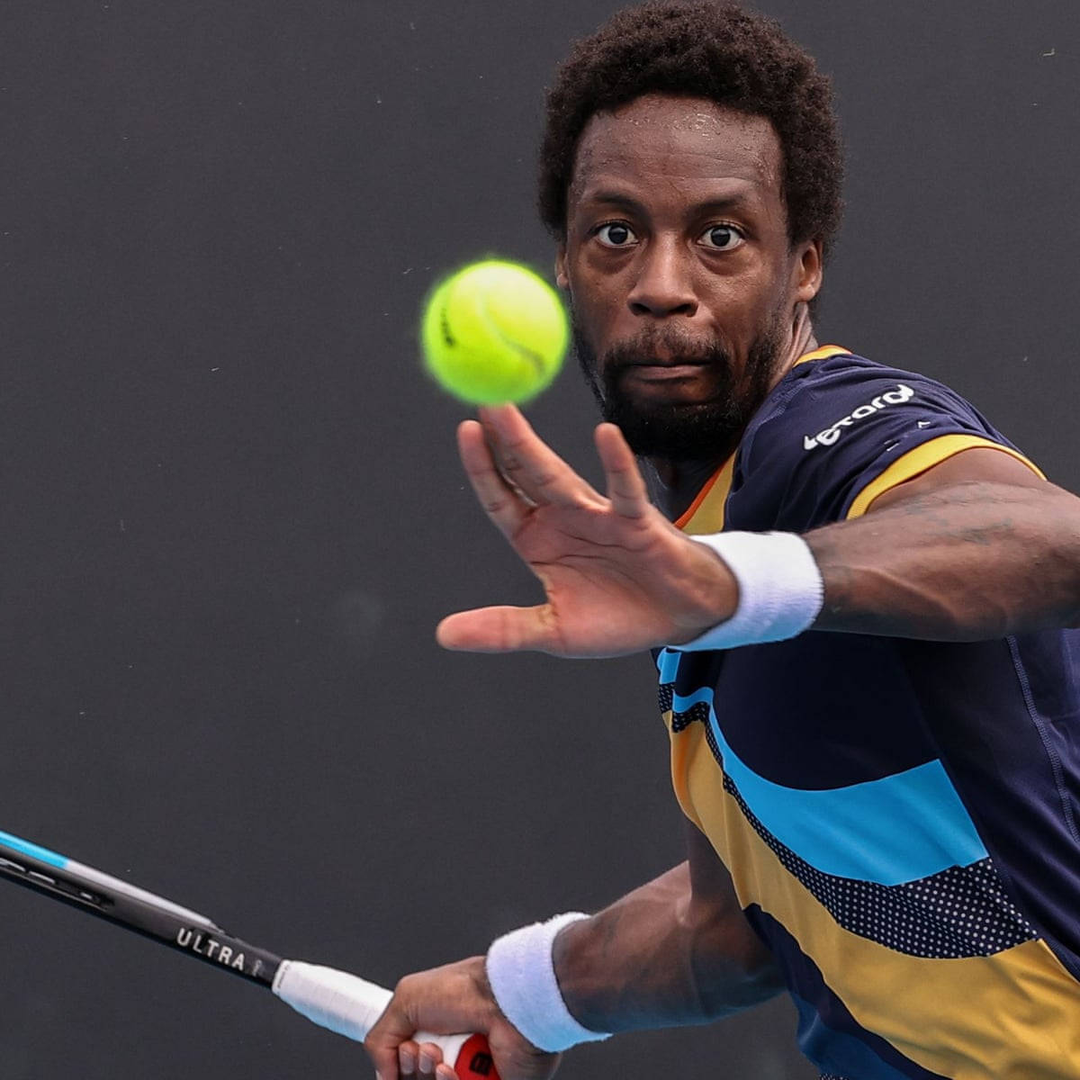 Gael Monfils Receiving Tennis Ball Wallpaper