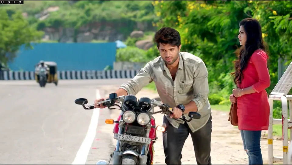 Geetha Govindam Vijay Pushing Motorcycle Wallpaper