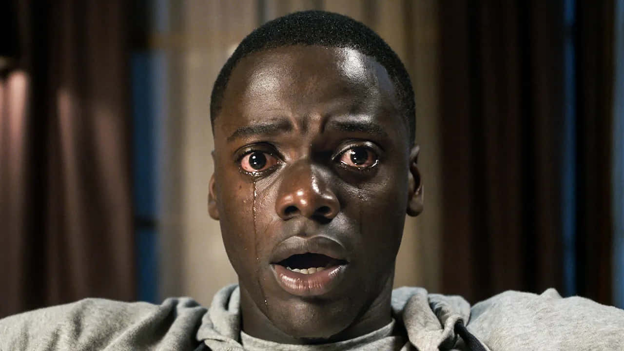 Get Out Movie Tearful Expression Wallpaper