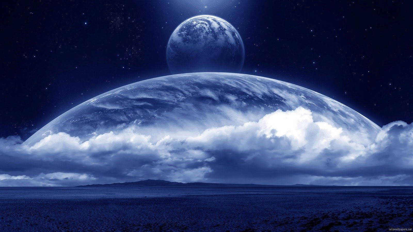 Glowing In The Night Sky, The Majestic Blue Moon Hangs Like A Beacon Of Light Wallpaper