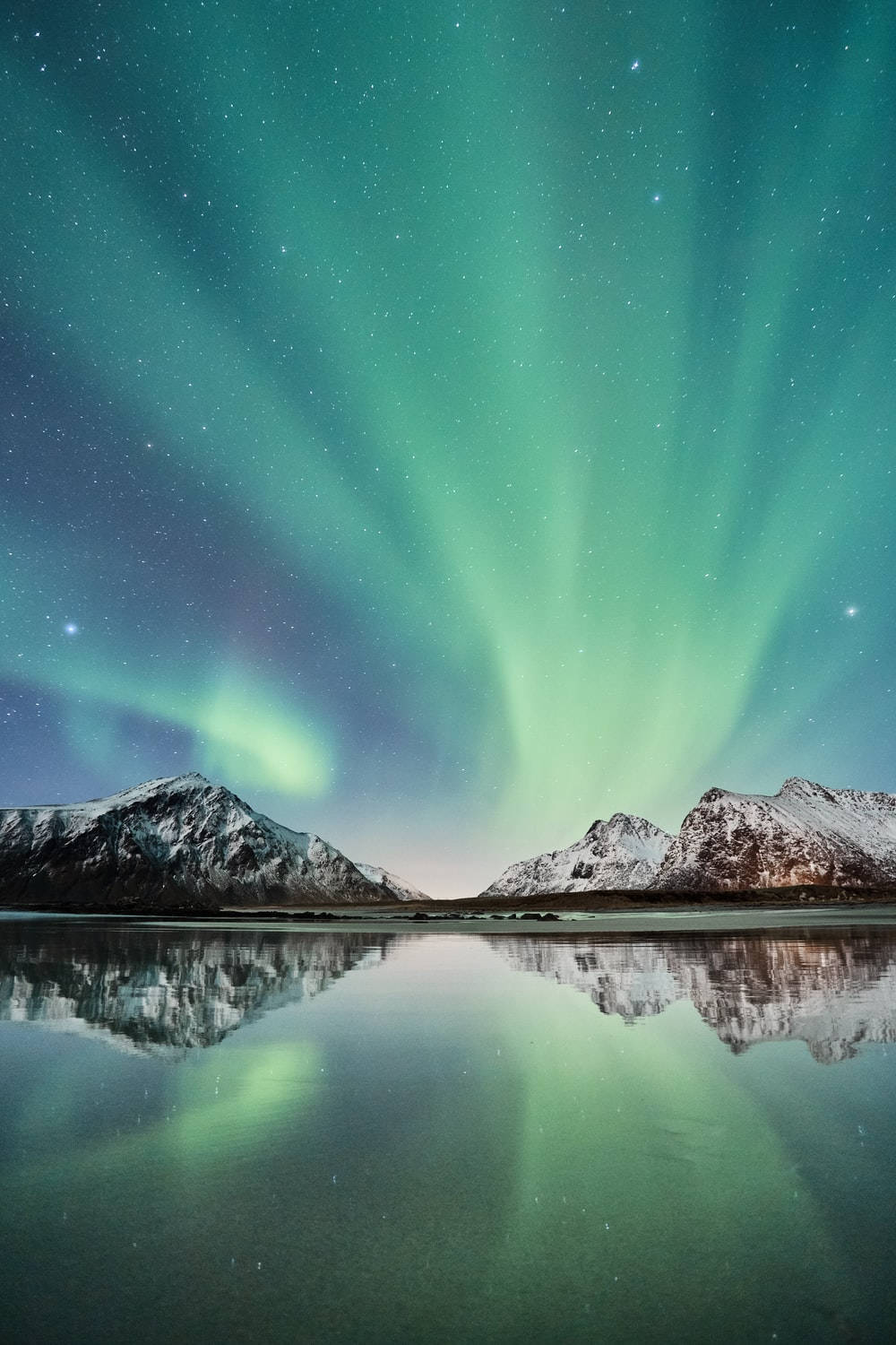 Green Sky And Ice Mountains Wallpaper