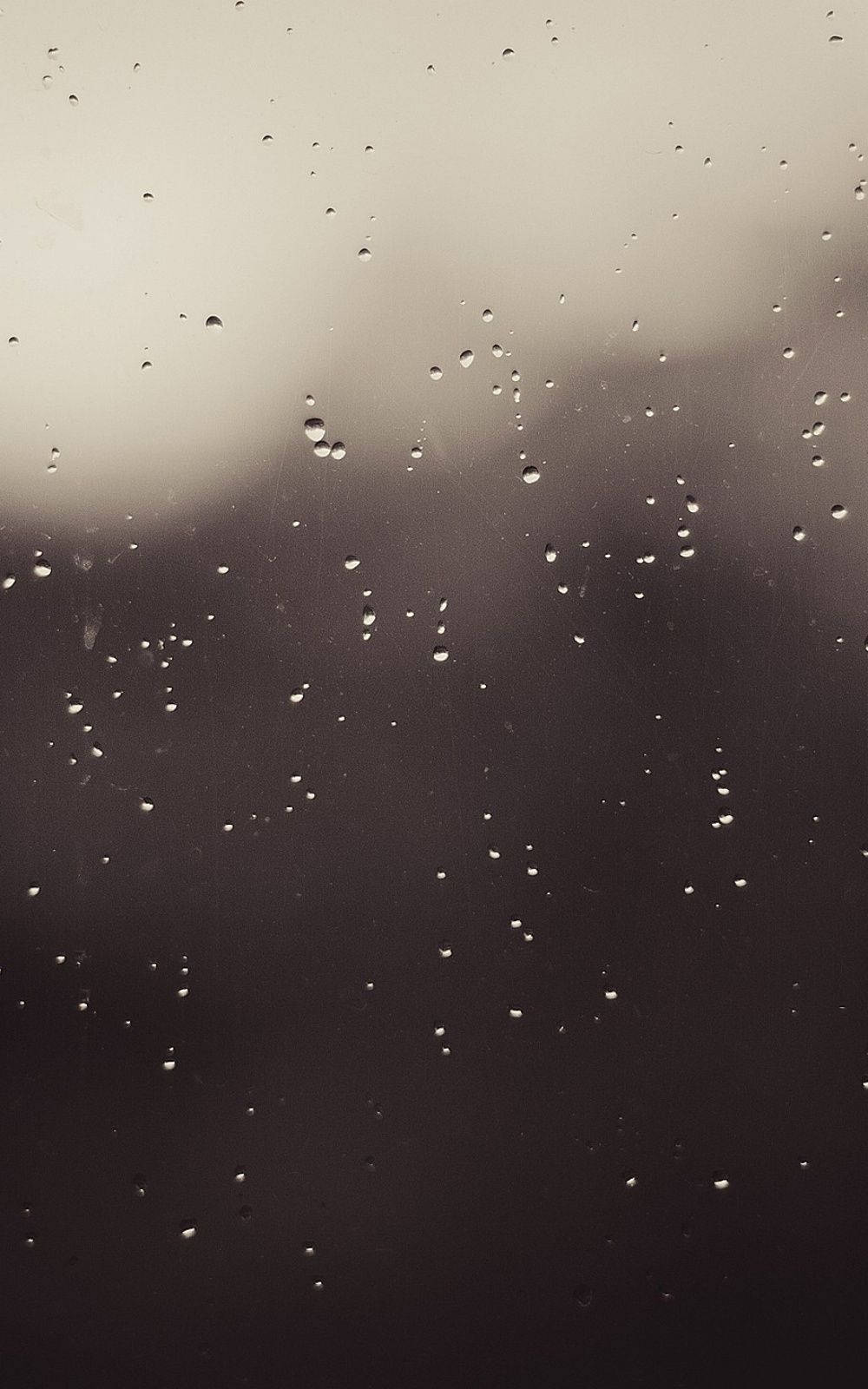 Grey Iphone Window With Rain Droplets Wallpaper