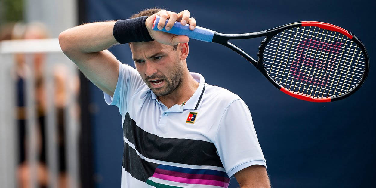 Grigor Dimitrov Wiping His Forehead Wallpaper