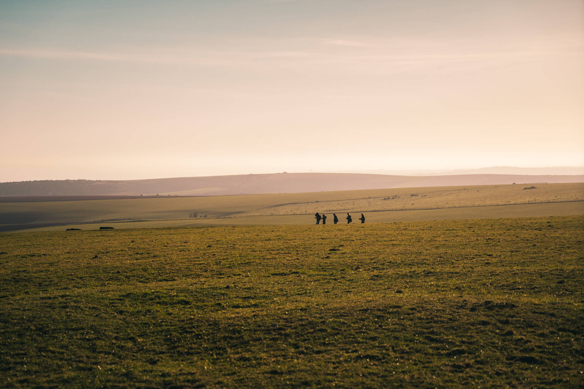 Group Of People Walking In The Diatnce Wallpaper