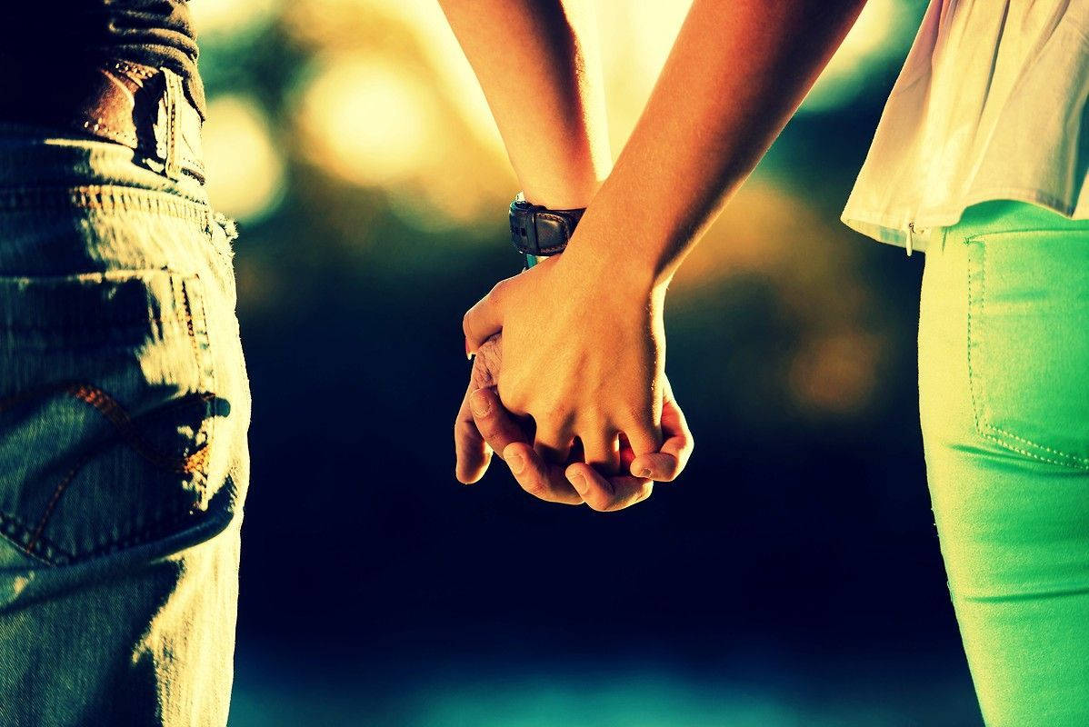 Hand In Hand Golden Sunlight Wallpaper