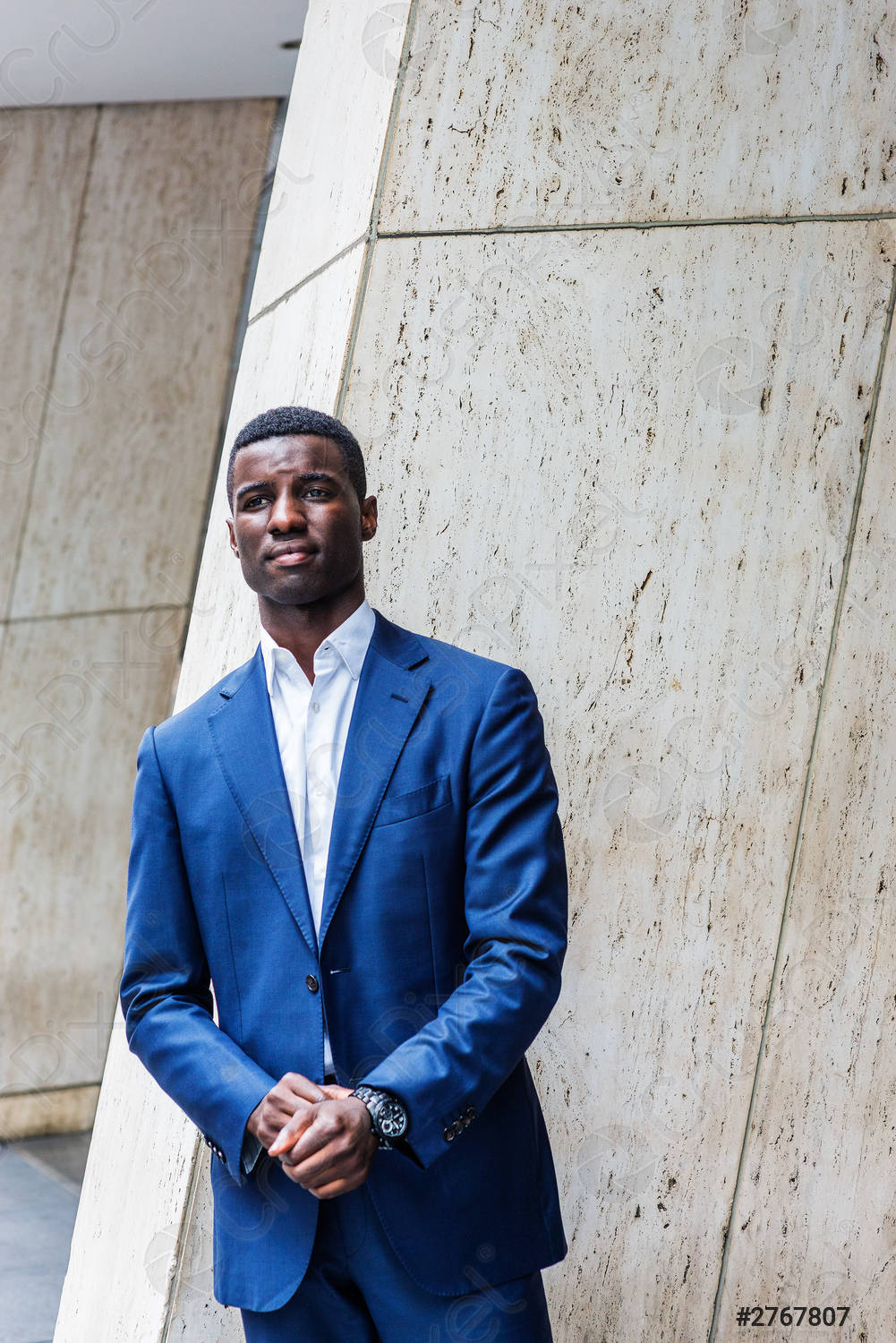 Handsome Black Man In A Blue Suit Wallpaper