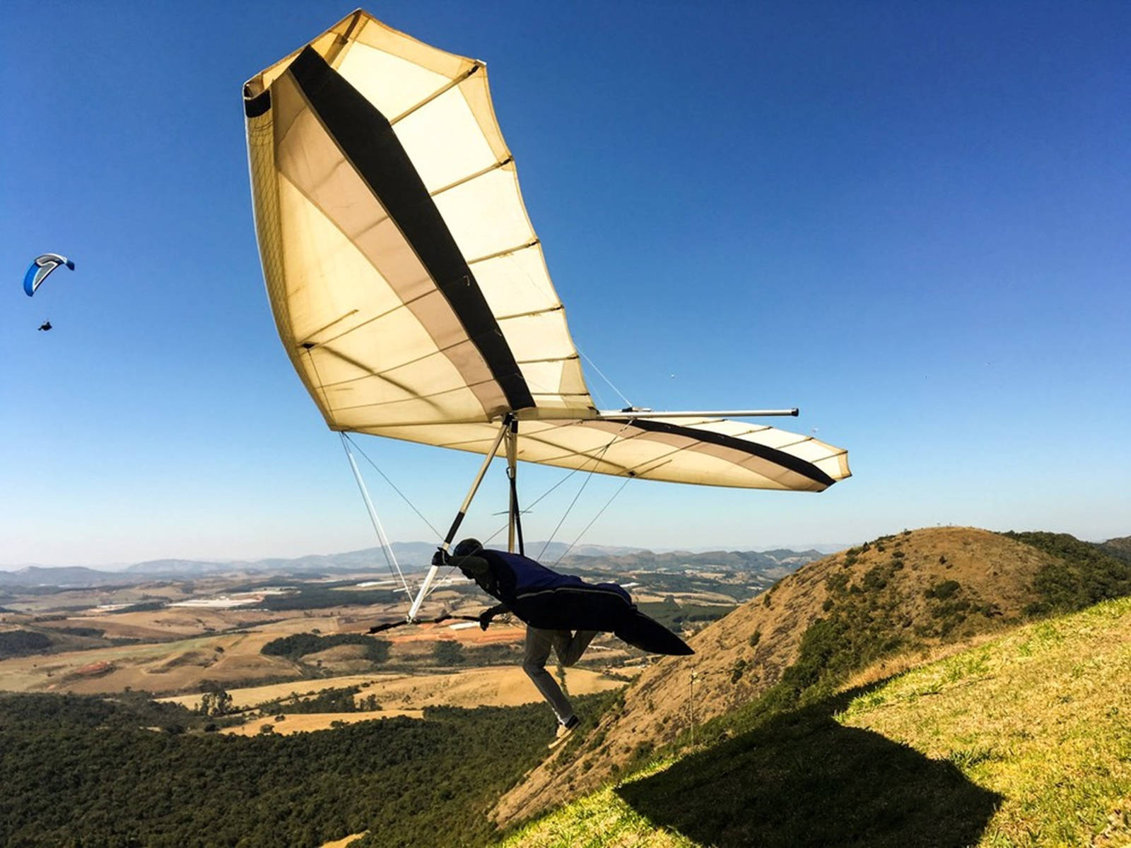 Hang Gliding Pilot Launch Hill Sunny Day Wallpaper