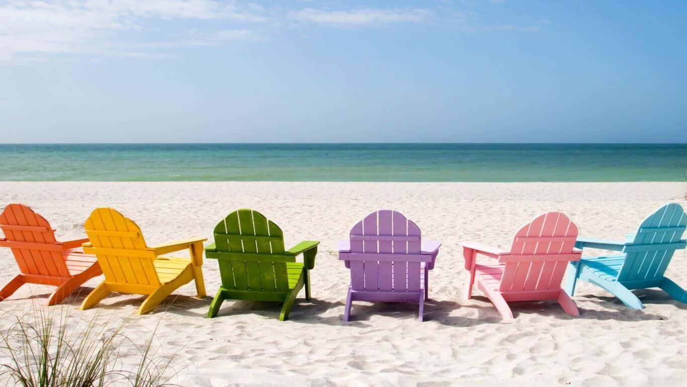 Hd Beach With Rainbow Chairs Wallpaper