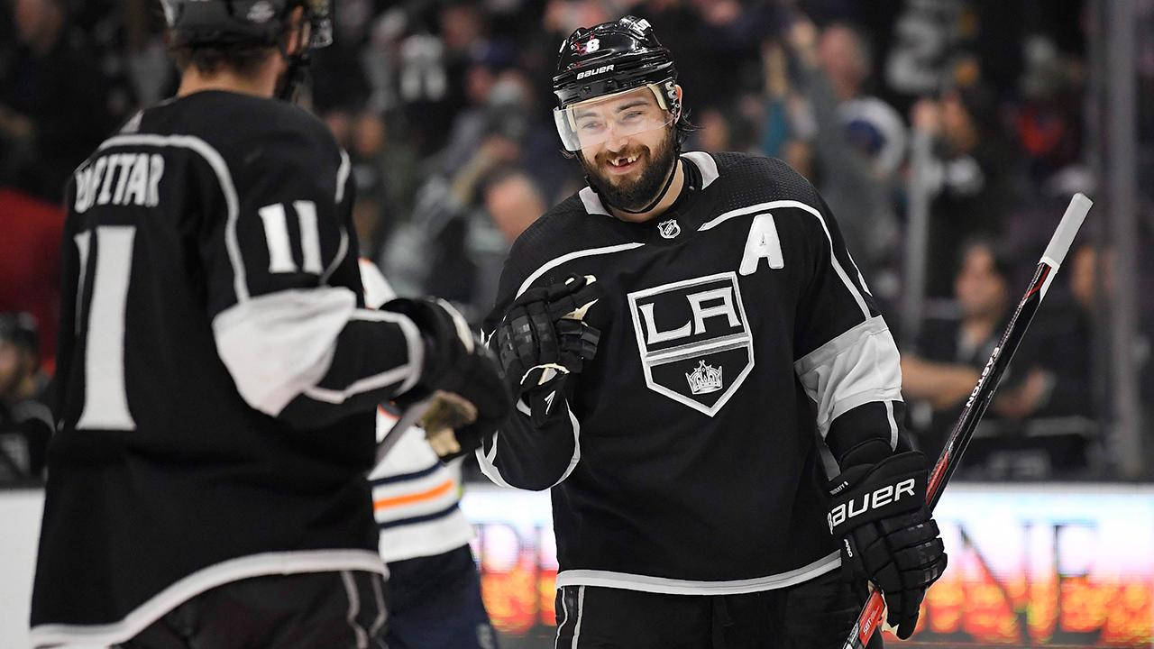 Hockey Star Drew Doughty Shares A Joyous Moment With Teammate Anze Kopitar Wallpaper