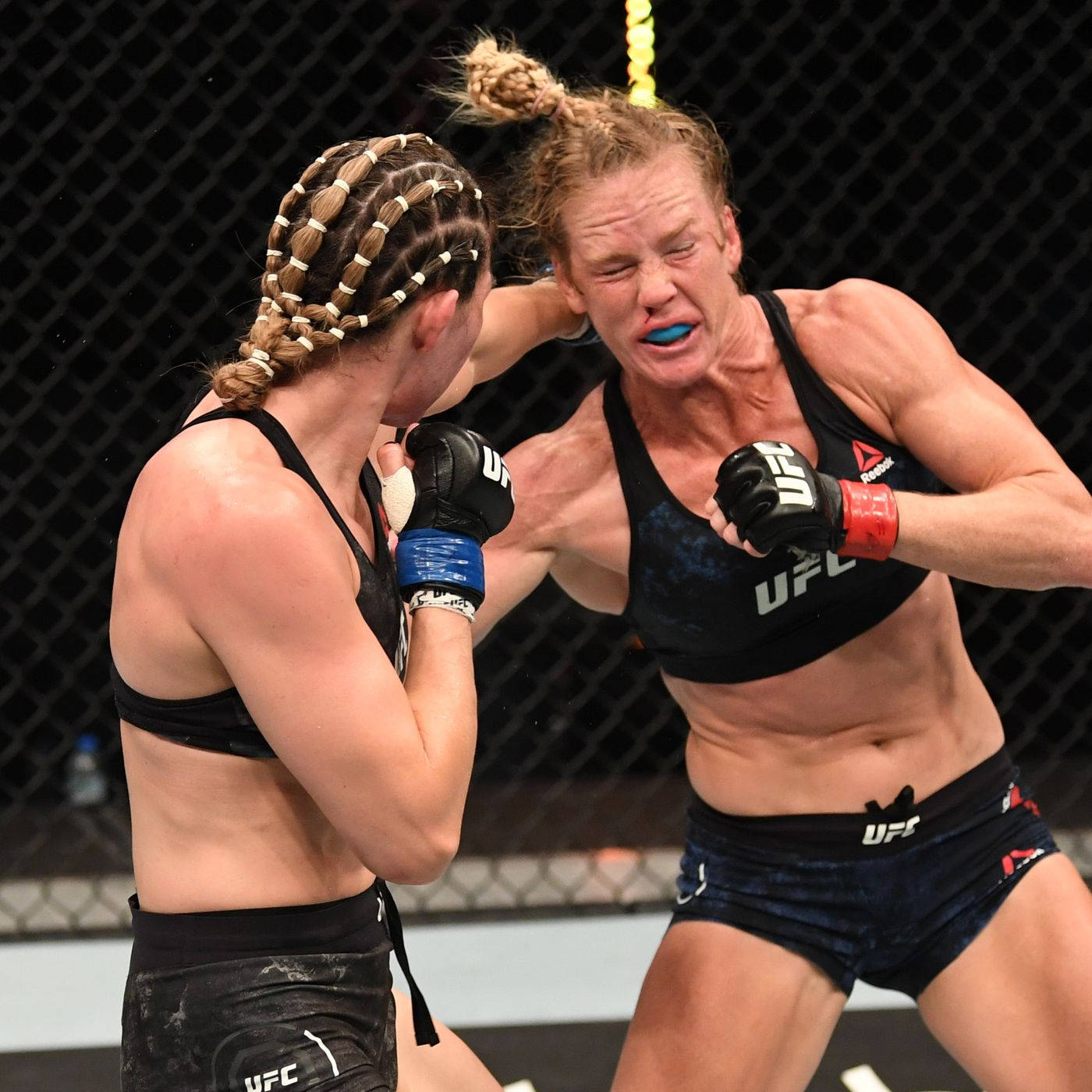 Holly Holm Versus Irene Aldana Wallpaper