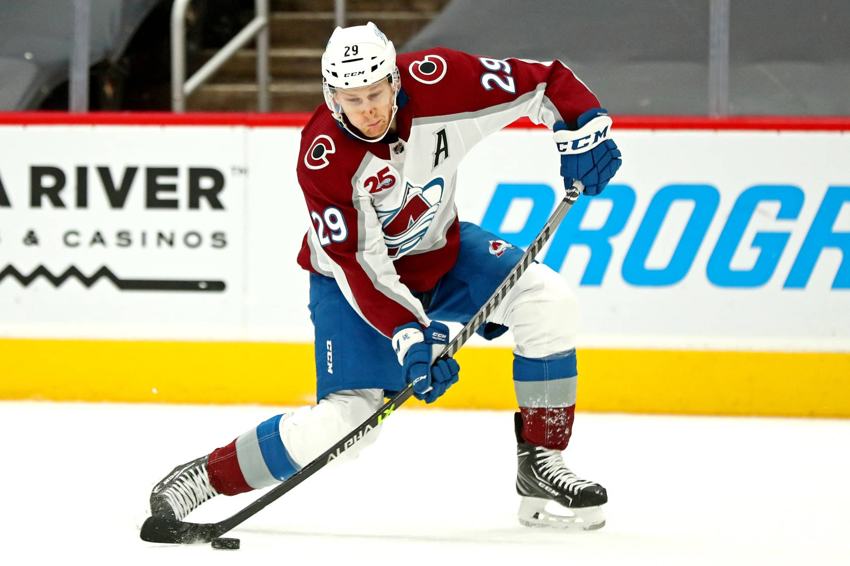 Ice Hockey Puck Nathan Mackinnon Wallpaper