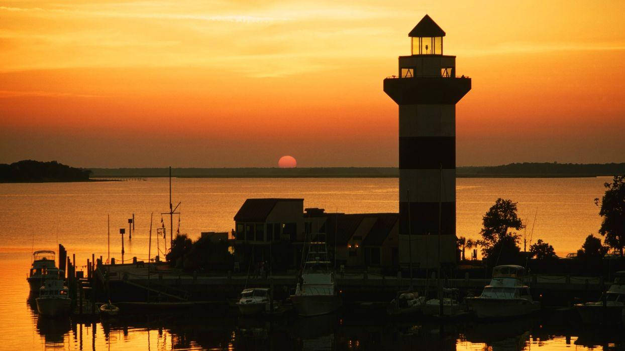 Iconic Harbour Town Lighthouse Silhouette At Dusk, South Carolina Wallpaper