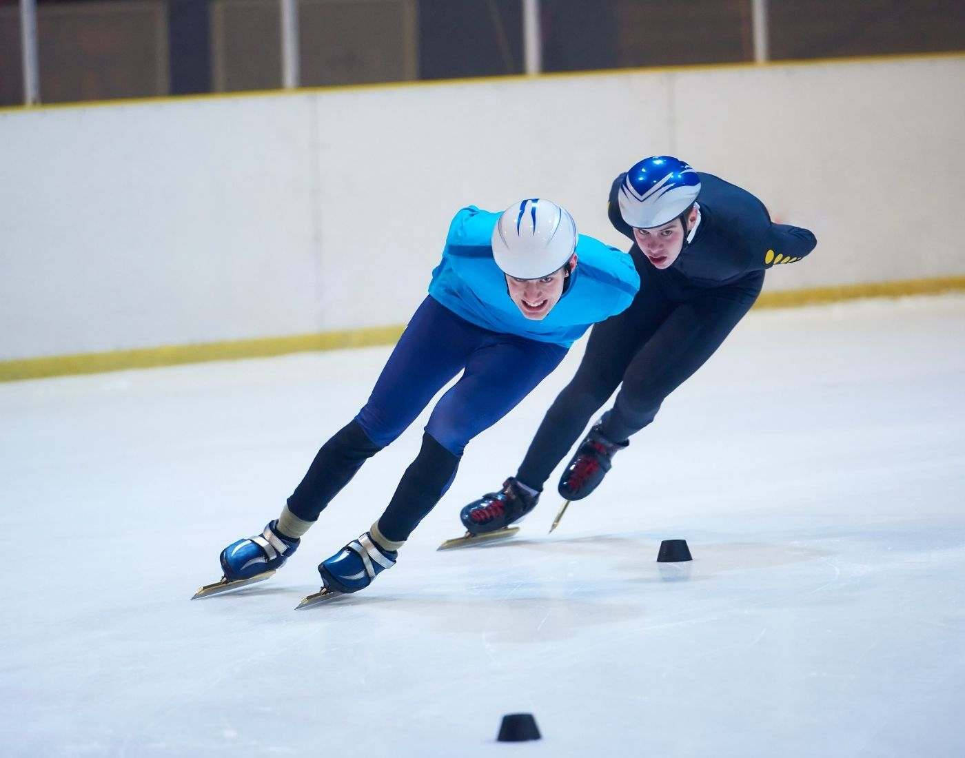 Intense Turn In Speed Skating Competition Wallpaper